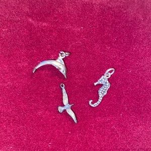 Ocean charms dolphin, seahorse and gull